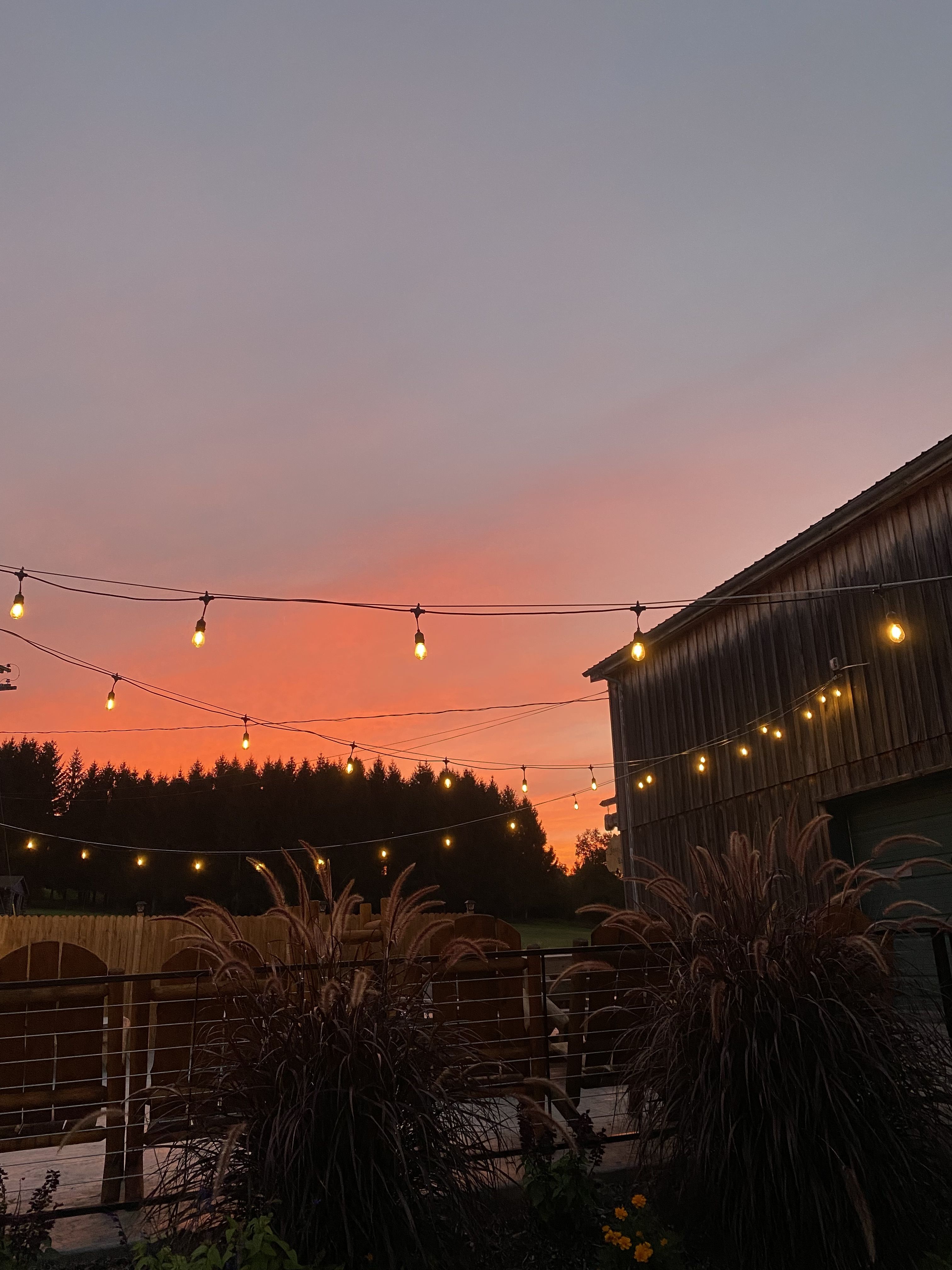 Sunset at O-Neh-Da Vineyard winery tasting room, steps from FLX Glamping